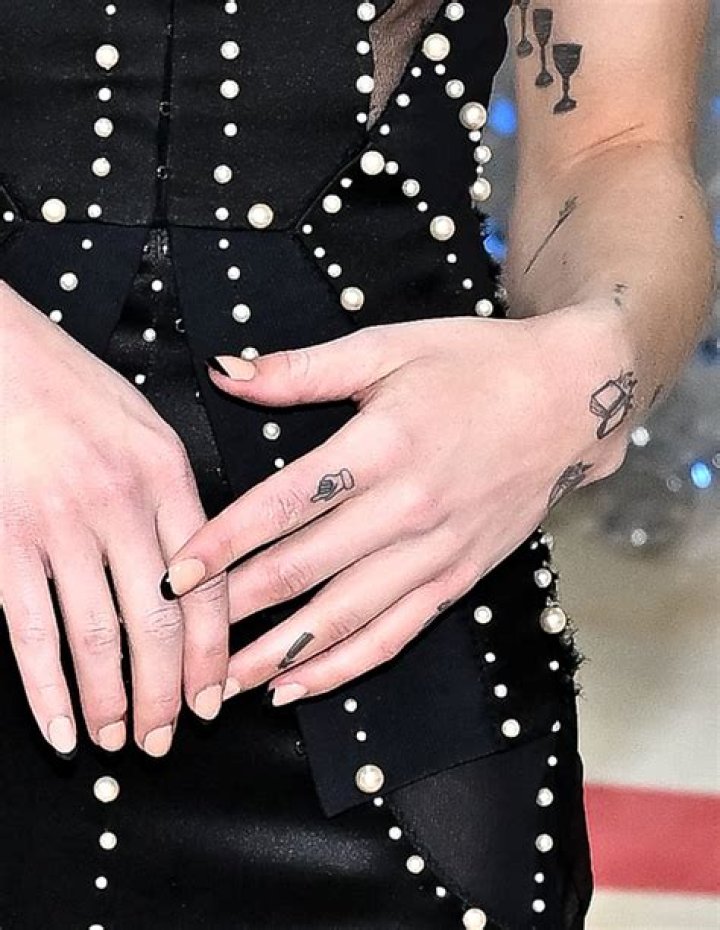Unlock the World of Phoebe Bridgers Tattoos: Discover Meanings and Inspiration